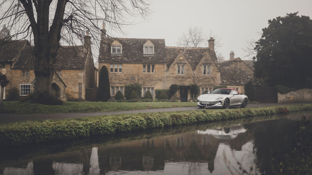 Landscape of MG Cyberster in Cotswolds next to a body of water